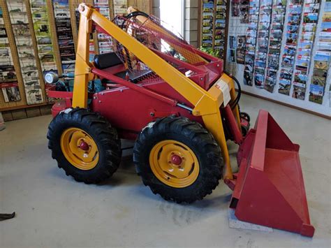 the first skid steer|who manufactured bobcat's first excavators.